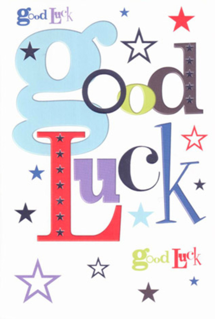 The good luck card in this scene has the warm, upbeat energy of a friend cheering from the sidelines, its message composed of colourful letters that dance across a clean white background. Each part of the phrase Good Luck is rendered in a different style, from broad, pastel-blue strokes to slender, inky black lines, bold reds, and deep purples, creating the sense that every letter has its own personality. Some appear tall and confident, others round and friendly, like a group of voices joining together in one supportive shout. Scattered across and around the wording, a flurry of stars brings movement to the design: tiny specks and larger, more defined shapes in navy, teal-tinged blue, soft lavender, and sky-blue. They feel as though they have drifted down from a clear evening sky above Norbiton's leafy back streets, where lights from terraced houses glimmer quietly through the trees. The white space is generous, allowing each colour to stand out without overwhelming the senses, much like a carefully arranged bouquet where every bloom has room to be seen. The card's surface looks velvety-smooth and gently matte, suggesting a premium, slightly weighty cardstock that would feel reassuringly solid when you hold it, with crisp printed edges you could almost follow with your fingertip. There are no metallic foils or raised elements, yet the layering of fonts and colours gives a subtle illusion of depth, as though the letters have been carefully laid on top of one another. This is the kind of card you might choose from a local Norbiton florist to slip beside bright blooms for someone awaiting exam results or preparing for a long-planned move, a simple yet heartfelt token that carries hope, excitement, and the quiet certainty that they're not facing the unknown alone.