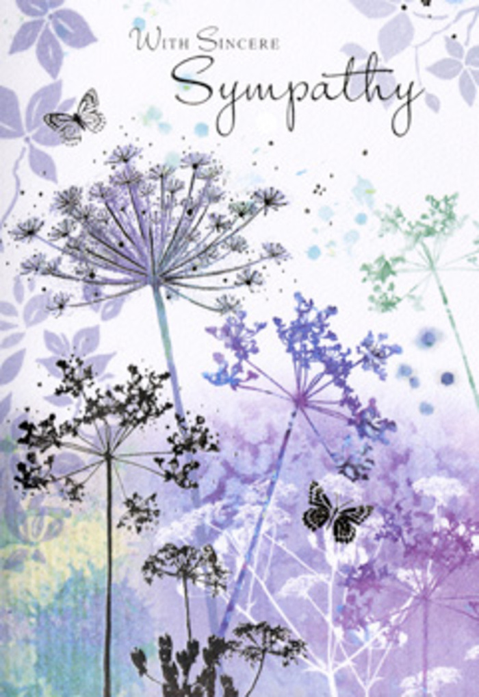 This sympathy card carries a serene floral illustration that unfolds slowly, like a quiet walk through Norbiton in early evening when colours turn cool and gentle. Rising from the lower edge of the card, tall, fine stems support delicate umbelliferous flower heads, their shapes reminiscent of cow parsley or wild dill seen at the edge of a country lane. The blossoms are drawn in intricate silhouettes, each tiny cluster of florets fanning out in lace-like patterns. Shades of lavender, dusky violet, and muted blue flow through the petals, touched with hints of soft grey and silvery green that seem to melt into the background. The artwork is predominantly watercolour, so the colours bleed softly into one another, creating a breezy wash that feels almost like a light mist settling over nearby green spaces. Behind the main flowers, faint outlines of additional stems and foliage add depth without crowding the composition, preserving a sense of open air and stillness. Two or more butterflies hover delicately among the blooms, their wings barely more than veils of colour, edged with fine lines of indigo and pale mauve. They appear weightless, giving the image a sense of gentle movement and quiet resilience-life continuing, even if softly. The lighting in the illustration is diffuse and subtle, with no harsh shadows, as if the scene were lit by a veiled sky. Above the floral meadow, a simple message of condolence rests in graceful script, conveying sympathy without intrusion. Crafted with a florist's understanding of symbolism and seasonal mood, this design offers a respectful, understated way for Norbiton families to share heartfelt condolences, echoing the calm beauty found in local gardens and tree-lined streets.