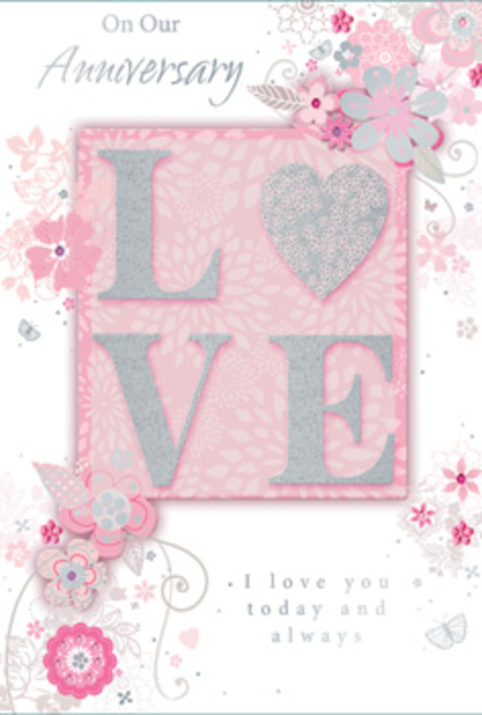 The anniversary card in this image has the quiet, sunlit charm of a cherished corner of Norbiton, where everyday love is treasured with gentle consistency. Its main motif, the word LOVE, stretches across the centre in large, raised letters, each one edged with a frosted glitter that catches the light with a soft, icy sparkle, offering a distinctly tactile delight to anyone who runs their fingers over it. Behind and around the letters, a blush-pink ground subtly shifts in tone, creating a faint halo effect that makes the central word feel important yet serene, much like a framed photograph on a mantelpiece in a local family home. Bordering this focal word, wispy, hand-drawn blooms and sprays of foliage drift lightly across the card's edges. The flowers are rendered in shades of pink, lilac, ivory, and pale grey, each petal defined with fine lines and gentle shading that recall the attentive detailing of a florist planning a romantic bouquet in a Norbiton workshop. Dainty leaves curl gracefully, and almost-hidden butterflies or tiny flourishes peek between the blossoms, suggesting the flutter of hearts on an anniversary morning. An affectionate message, reading I love you today and always in understated, elegant type, is tucked thoughtfully near the design, inviting a quiet pause of gratitude. The card feels like a hand-tied bouquet translated into paper, full of soft romance and quiet artistry, ideal for presenting alongside fresh anniversary flowers delivered to homes near Norbiton station or along Coombe Road.