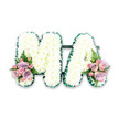 A graceful letter tribute spelling MA is captured in a clear product-style image, ideal for families in Norbiton looking for a refined floral farewell for a mother or maternal figure. The two capital letters stand side by side, densely packed with pure white chrysanthemums whose small, rounded blooms create a beautifully even, cushion-like surface. Each flower head is pristine and unblemished, their tightly layered petals giving the arrangement a sense of quiet strength and purity. Encircling the outer edge of both letters is a carefully folded emerald green ribbon, its satin surface gently reflective under soft lighting. The ribbon is pleated to follow the contours of the M and A, lending structure and definition and introducing a smart contrast that frames the white blooms with subtle sophistication. At the base of the left stroke of the M and the right stroke of the A, two coordinating flower groupings soften the overall design with muted colour. These feature soft pink roses and dusky lilac blooms, interwoven with smaller pink spray roses that add a hint of delicacy. Sprigs of fresh greenery and feathery fern fronds emerge from between the roses, echoing the natural textures of nearby parks and gardens around Norbiton. The white background keeps the focus entirely on the shape, colour and detail of the tribute, allowing viewers to appreciate the care in every placement. It is a piece that feels both personal and dignified, a floral expression of thanks and love for a Ma whose memory will remain central to family life long after the service has ended.